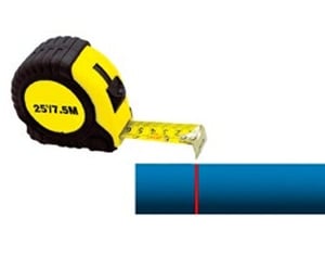 measuring the length of pipe with measuring tape